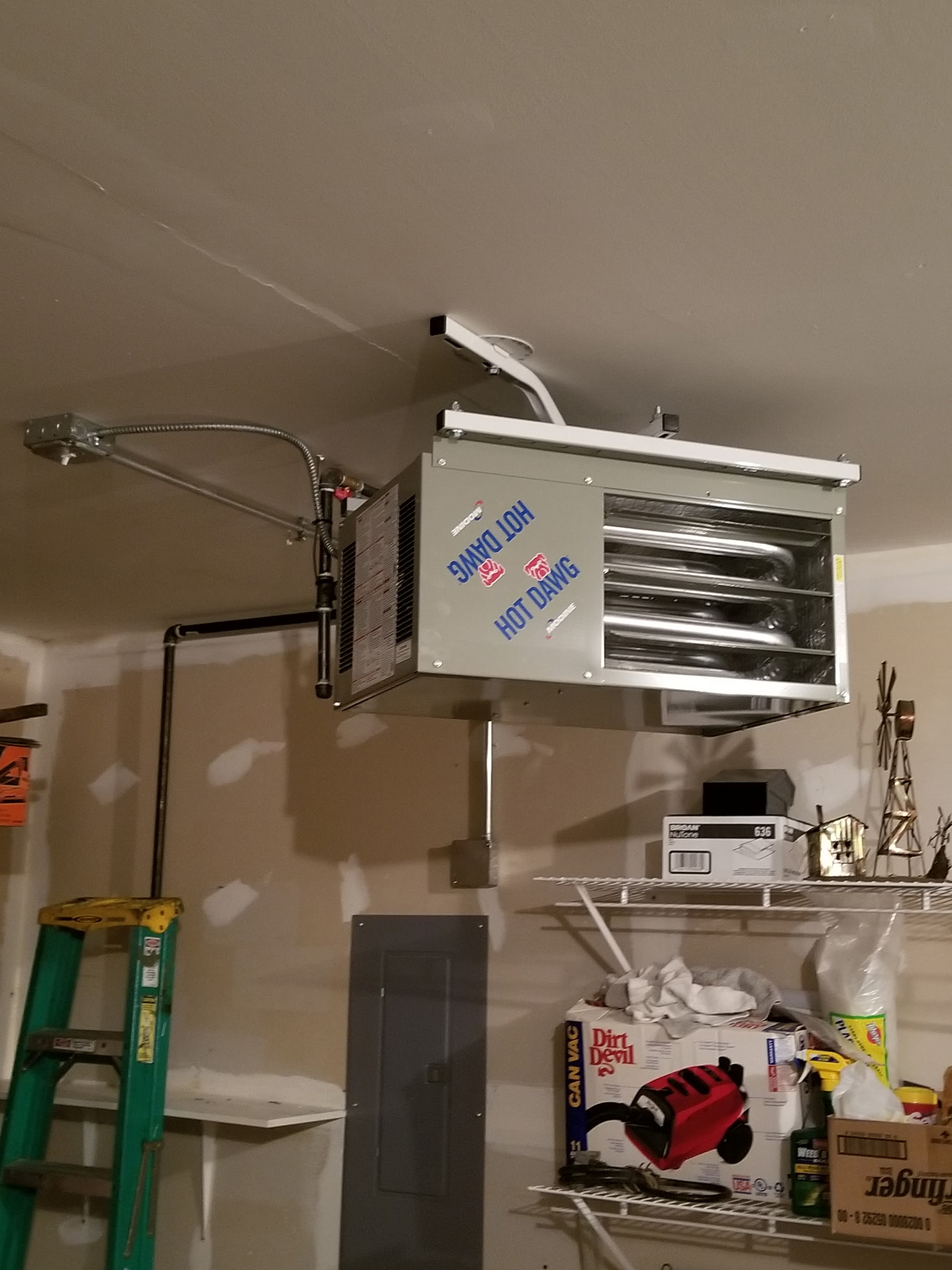 Modine Hot Dawg unit heater installed cleanly in a residential garage by J & L Mechanical